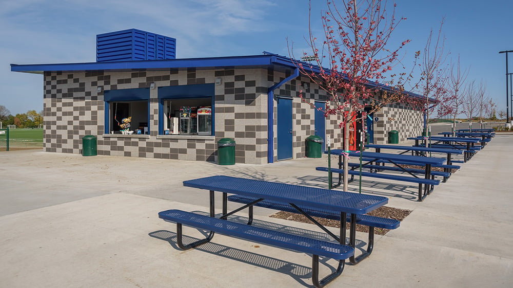 The complex’s centerpiece building provides space for concessions, field maintenance equipment, restrooms, staff office and referee check-in.