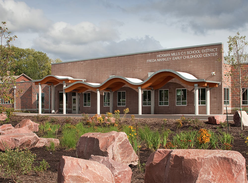 A whimsical undulating canopy sets tone for fun learning environment within